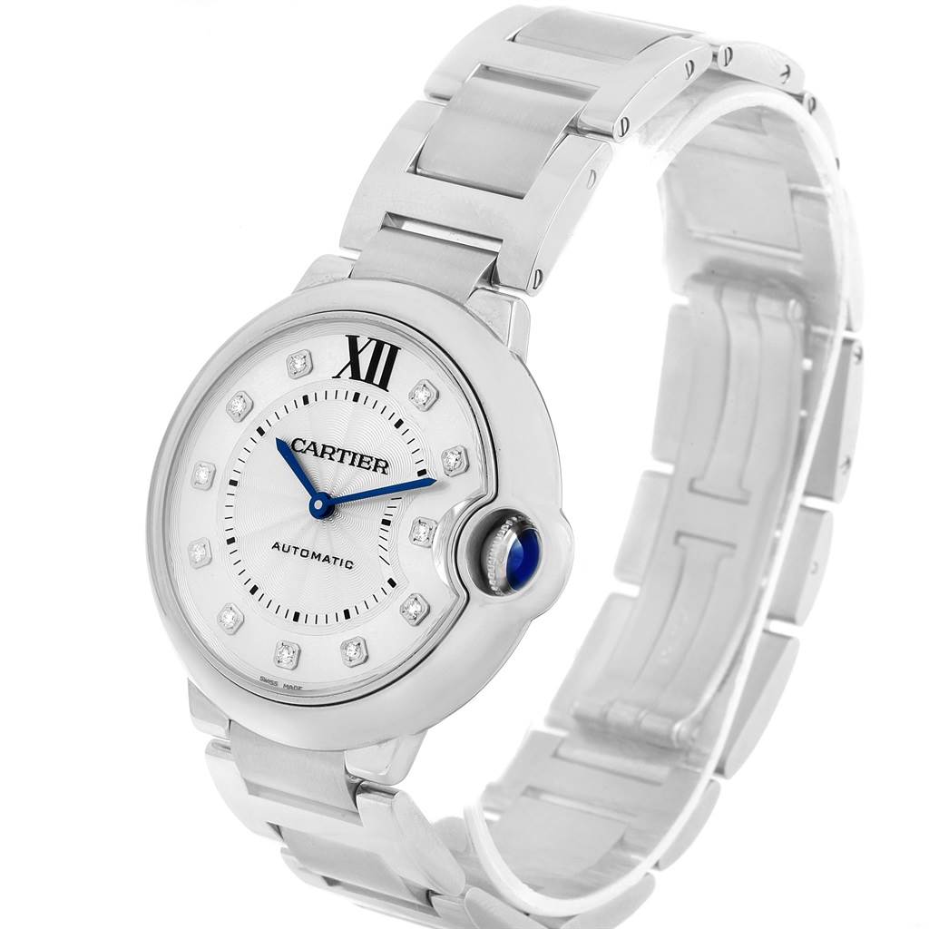 The image shows a front angle of the Cartier Ballon Bleu WE902075 Women
s Stainless Steel Silver Dial WE902075 Women
s Stainless Steel Silver Dial watch, highlighting its face, bezel, and bracelet.