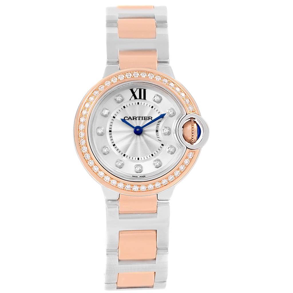 This image shows a front view of a Cartier Ballon Bleu WE902076 Women
s Steel and Gold (two tone) Silver Dial WE902076 Women
s Steel and Gold (two tone) Silver Dial watch, highlighting its round face, bezel, and bracelet.