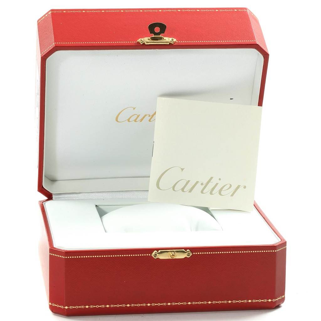 The image shows a Cartier Ballon Bleu W6920070 Women's Steel and Gold (two tone) Mother of Pearl Dial W6920070 Women's Steel and Gold (two tone) Mother of Pearl Dial watch box and booklet, stylishly opened, highlighting the packaging and documentation.