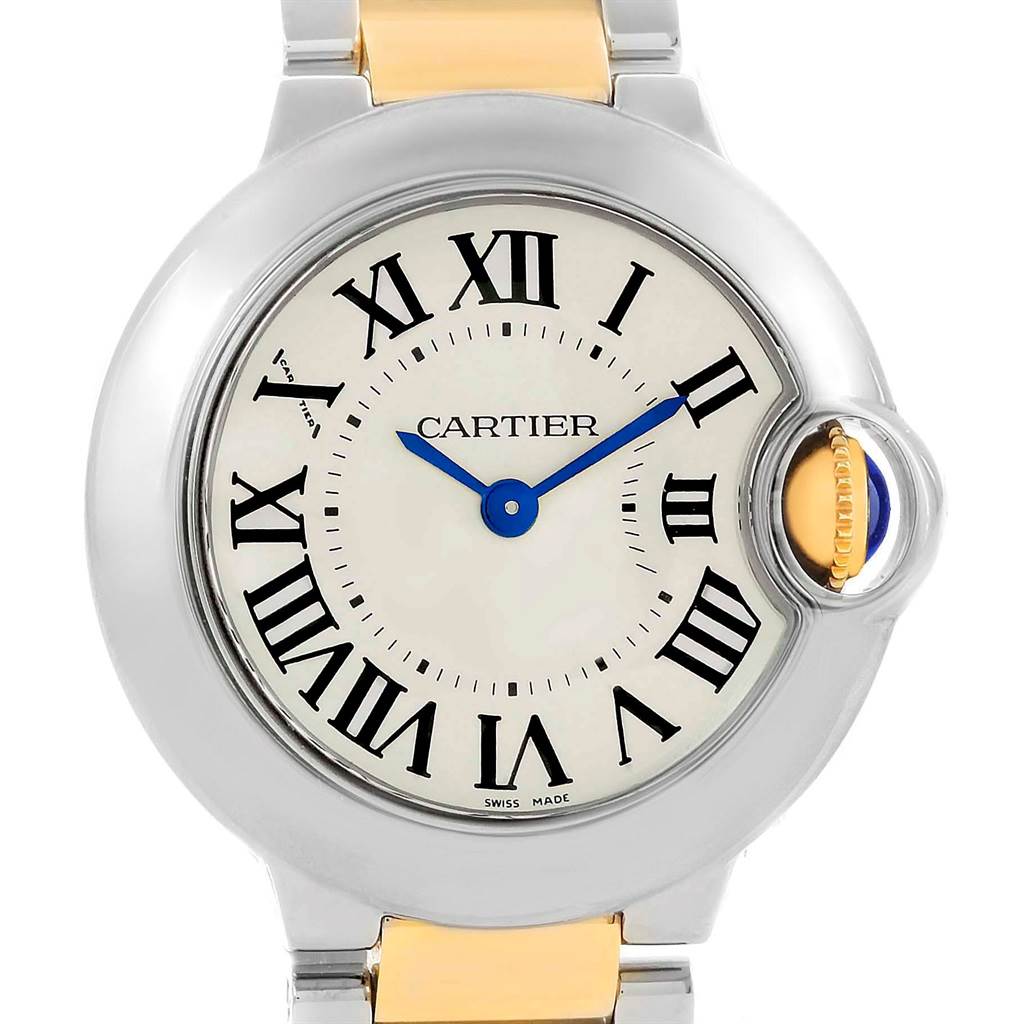 This image shows a frontal view of the Ballon Bleu de Cartier watch, highlighting its round face, Roman numerals, and distinctive crown.