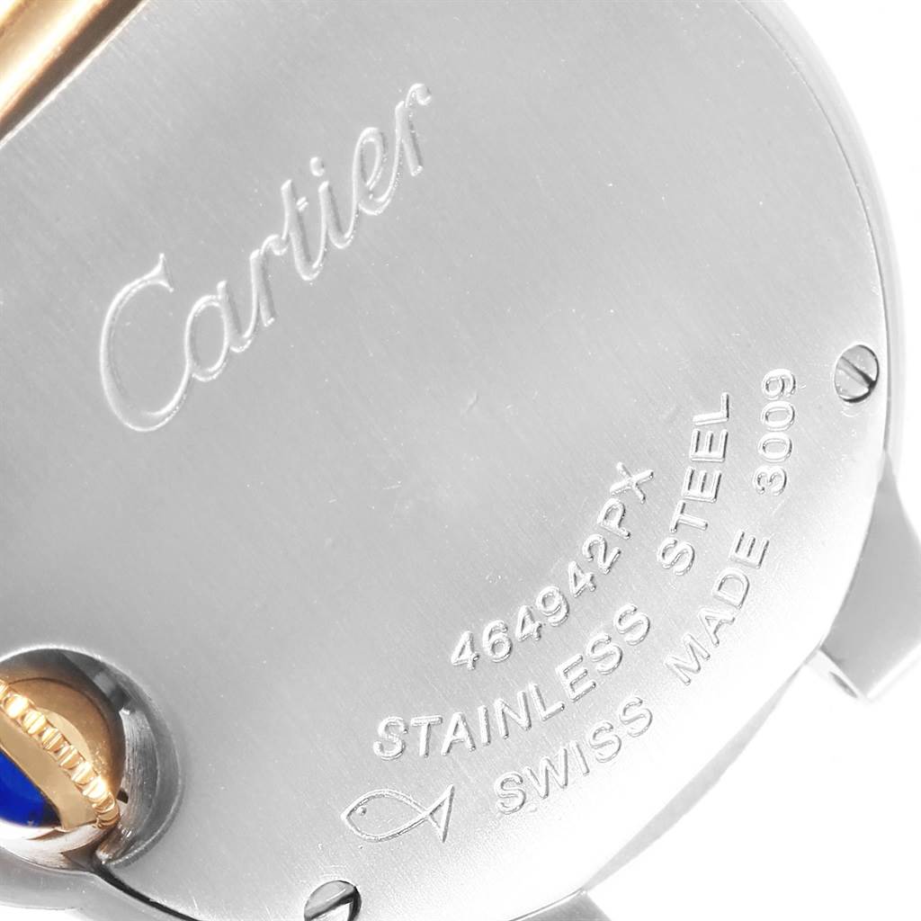 This image shows the back case and crown of a Cartier Ballon Bleu W69007Z3 Women
s Stainless Steel Silver Dial W69007Z3 Women
s Stainless Steel Silver Dial watch, highlighting the engraved branding and model details.