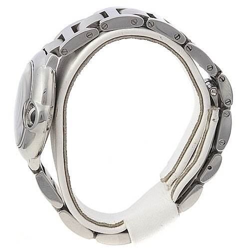 The image shows a side view of the Ballon Bleu watch by Cartier, highlighting its case, crown, and metal bracelet links.