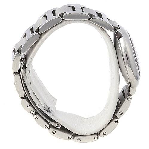 The image shows a side view of a Ballon Bleu model by Cartier, focusing on the watch
s case and the metal bracelet.