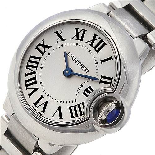 The image shows a Cartier Ballon Bleu W69010Z4 Women
s Stainless Steel Silver Dial W69010Z4 Women
s Stainless Steel Silver Dial watch from an angled top-down view, displaying the dial, Roman numerals, blue hands, and part of the metal bracelet.