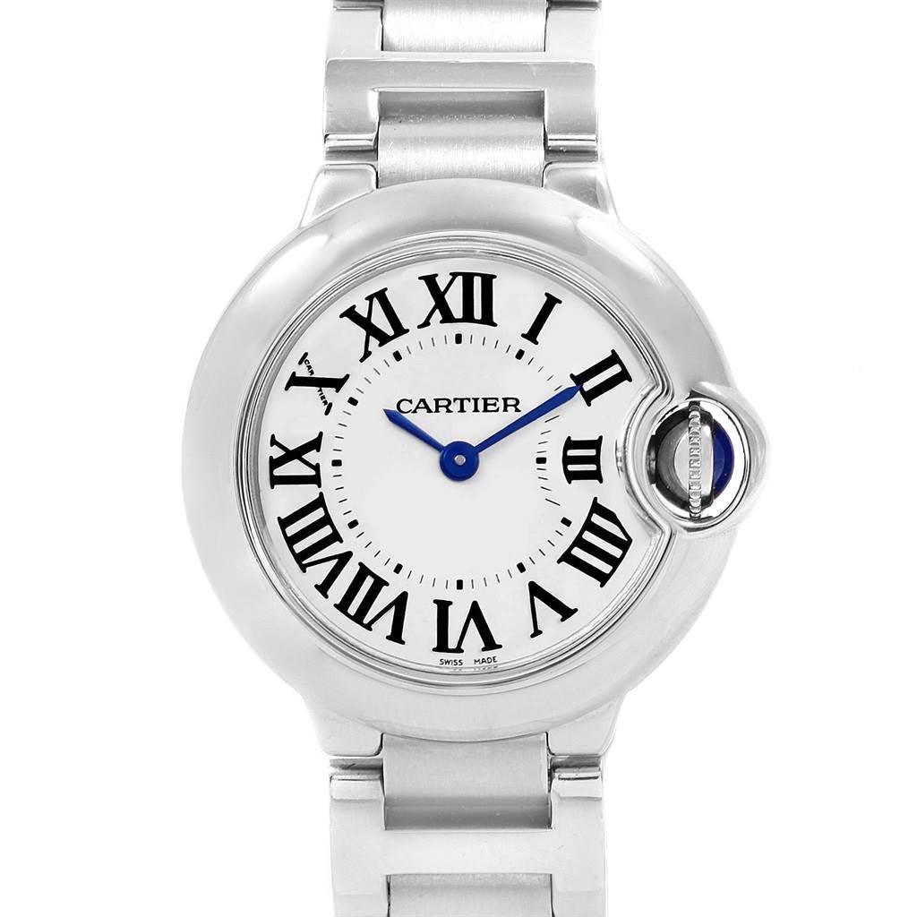 This image shows a front view of the Cartier Ballon Bleu W69010Z4 Women
s Stainless Steel Silver Dial W69010Z4 Women
s Stainless Steel Silver Dial watch, highlighting the dial, Roman numerals, blue hands, and part of the metal bracelet.