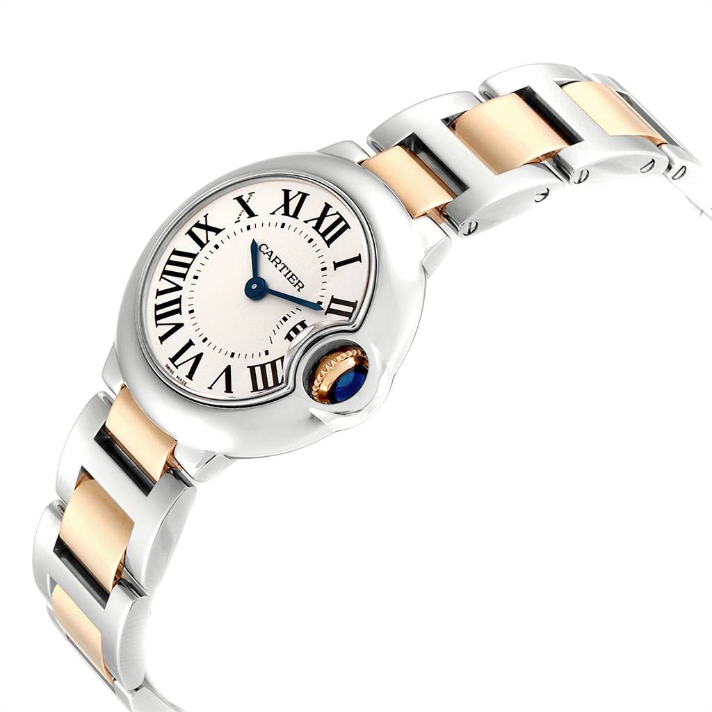 The Cartier Ballon Bleu W69007Z3 Women
s Stainless Steel Silver Dial W69007Z3 Women
s Stainless Steel Silver Dial watch is shown at an angle, highlighting its face, bracelet, and distinctive crown with a blue gem.