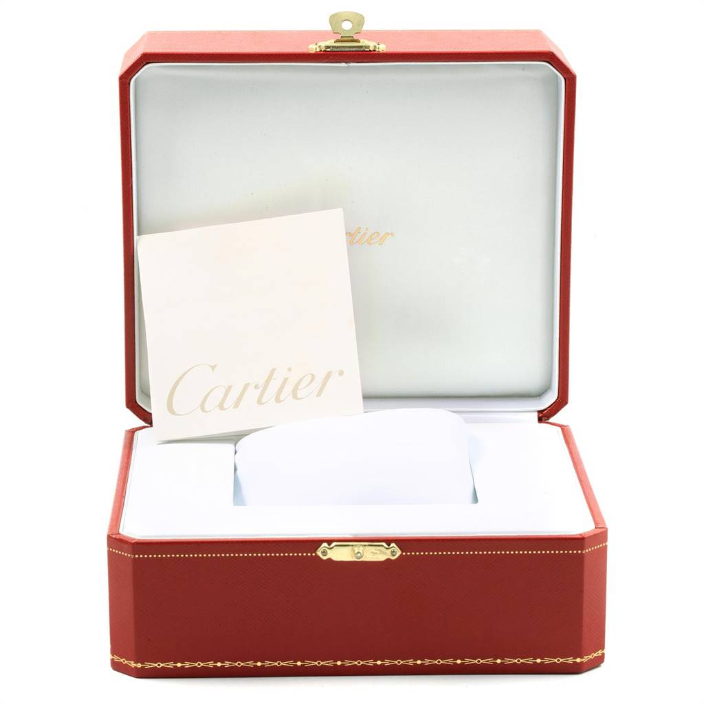 This image shows an open red Cartier watch box for the Ballon Bleu model, with a Cartier card inside.