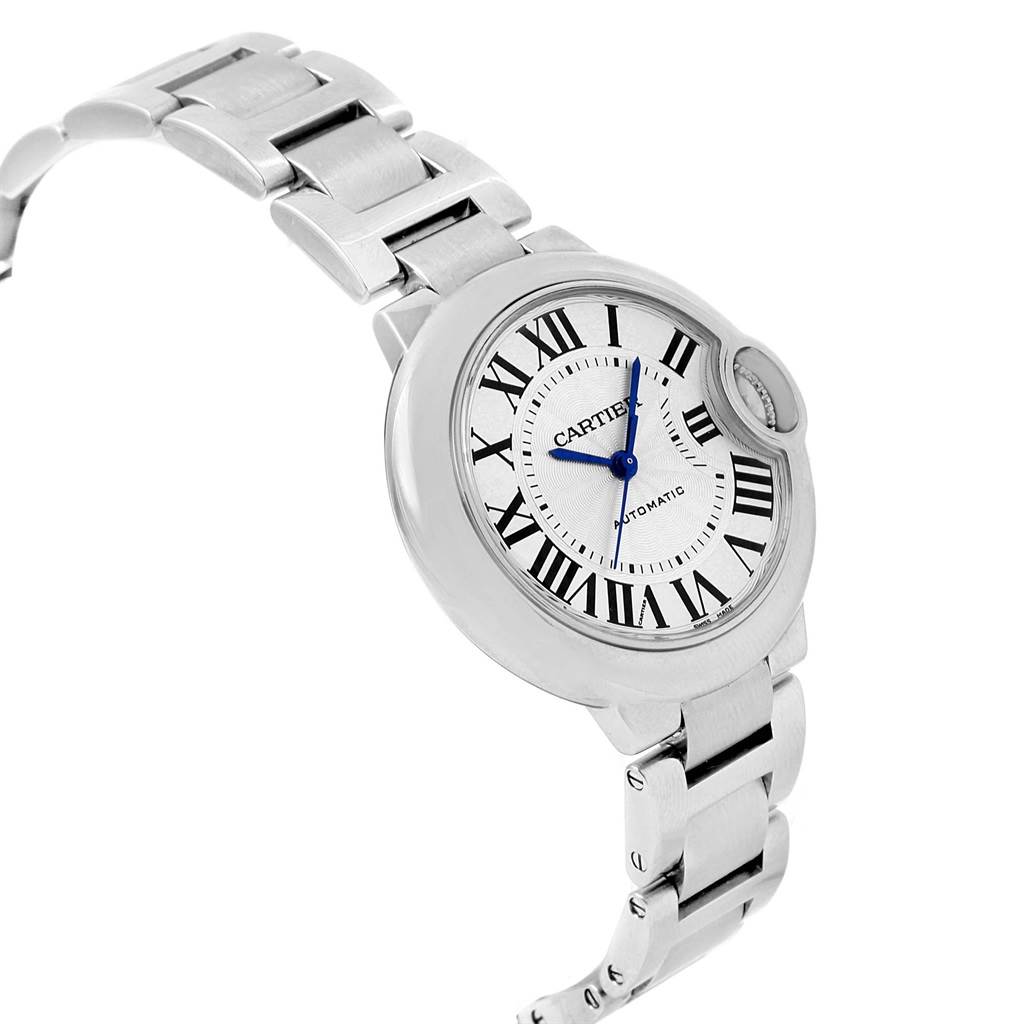 The image shows a Cartier Ballon Bleu W6920071 Women
s Stainless Steel Silver Dial W6920071 Women
s Stainless Steel Silver Dial watch at a three-quarter angle, highlighting its round case, bracelet, and Roman numeral dial.