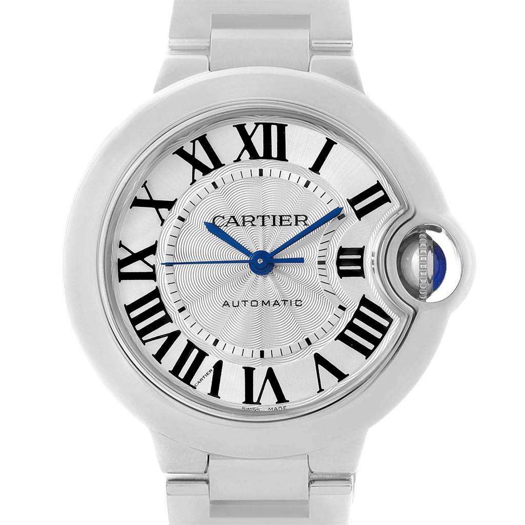 The image shows a close-up of the Cartier Ballon Bleu W6920071 Women
s Stainless Steel Silver Dial W6920071 Women
s Stainless Steel Silver Dial watch face, featuring its dial, Roman numerals, and blue hands.