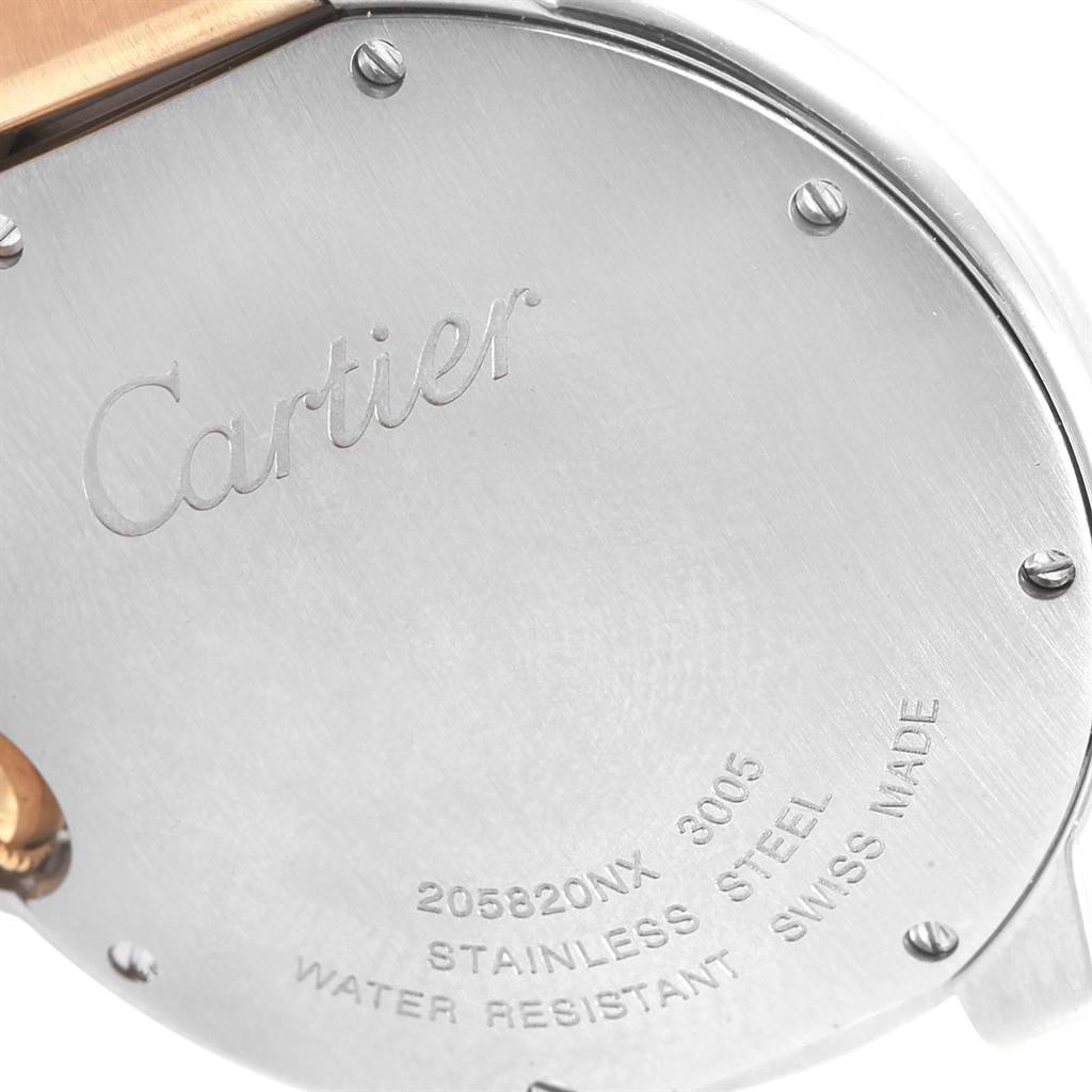 This image shows the back case of a Cartier Ballon Bleu W69008Z3 Men
s Steel and Gold (two tone) Silver Dial W69008Z3 Men
s Steel and Gold (two tone) Silver Dial watch, displaying the "Cartier" engraving and model details.