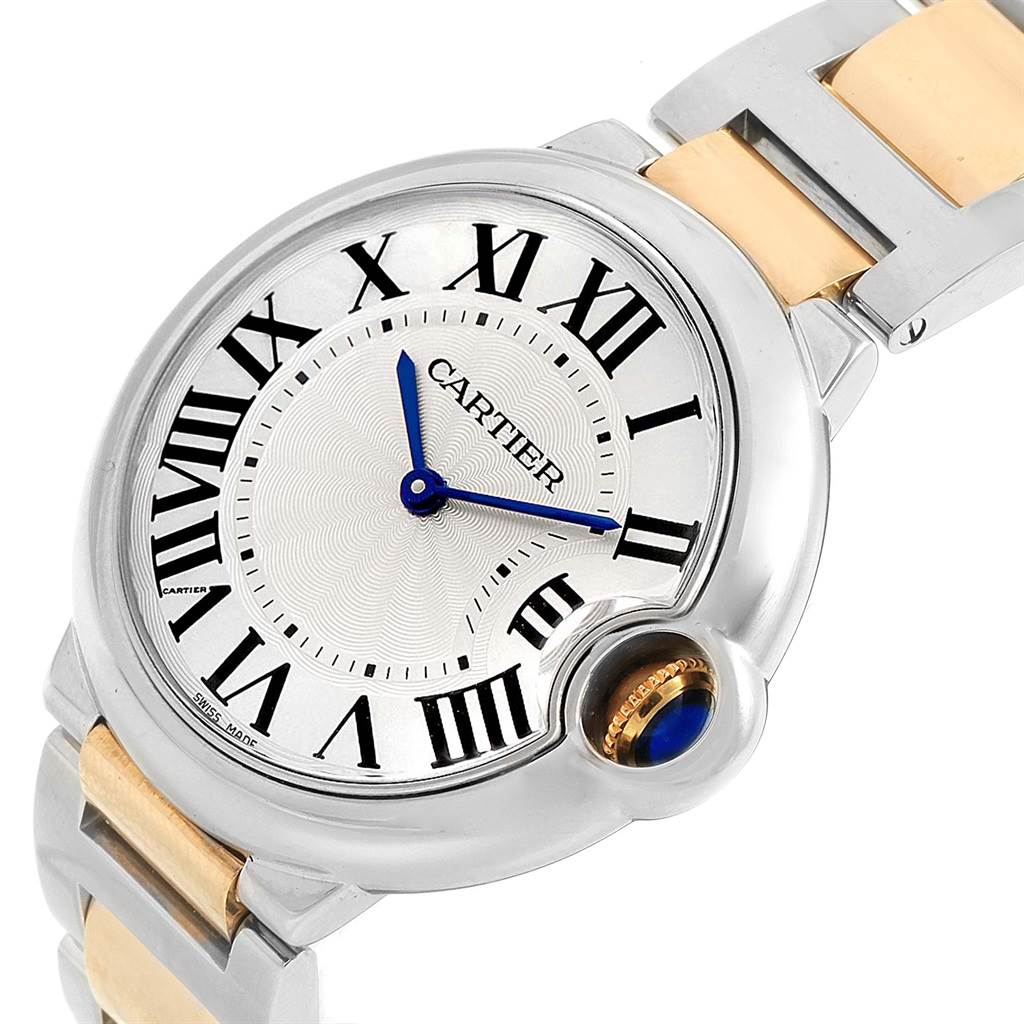 The image shows a close-up view of the Cartier Ballon Bleu W69008Z3 Men
s Steel and Gold (two tone) Silver Dial W69008Z3 Men
s Steel and Gold (two tone) Silver Dial watch face and partial bracelet from an angled perspective.