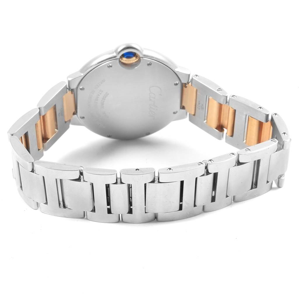 The image shows the back case and bracelet of a Cartier Ballon Bleu W69008Z3 Men
s Steel and Gold (two tone) Silver Dial W69008Z3 Men
s Steel and Gold (two tone) Silver Dial watch from a rear angle.