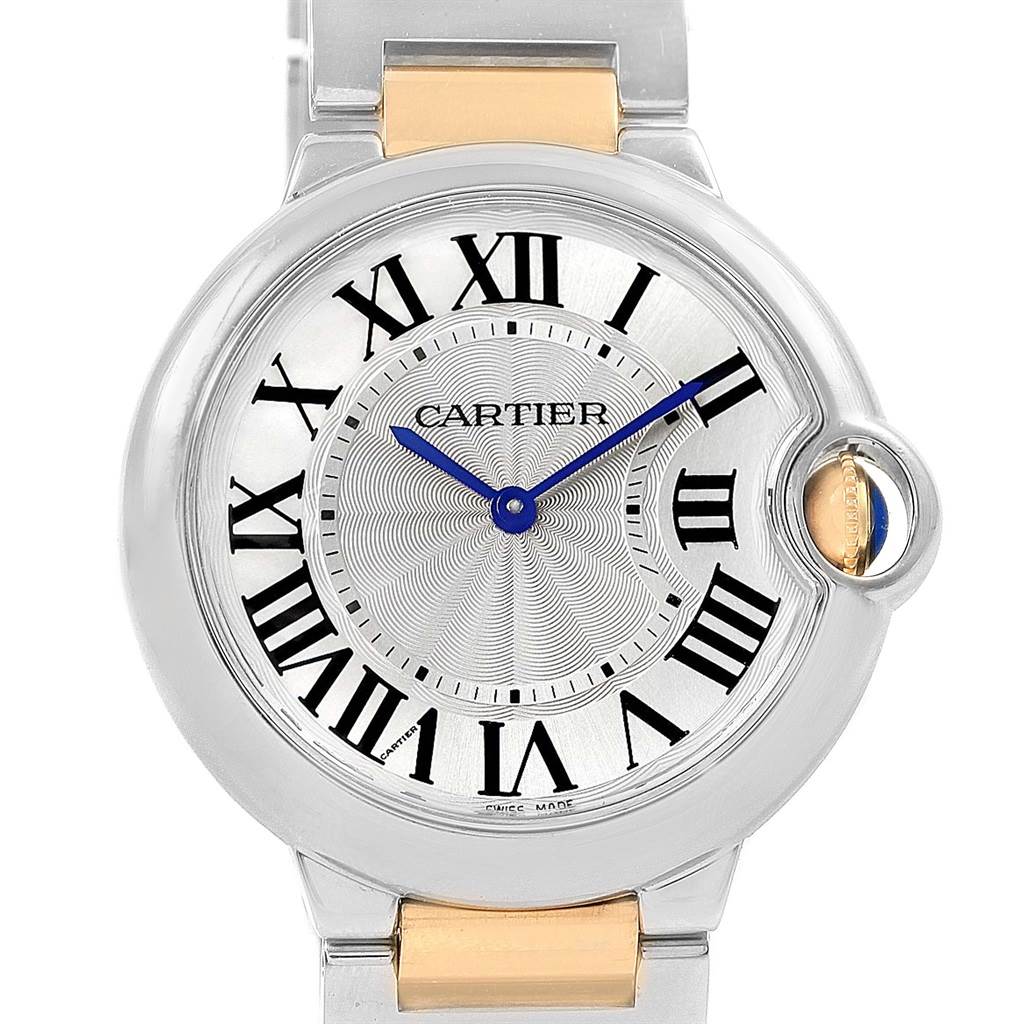 The image shows a front view of the Cartier Ballon Bleu W69008Z3 Men
s Steel and Gold (two tone) Silver Dial W69008Z3 Men
s Steel and Gold (two tone) Silver Dial watch featuring its dial, Roman numerals, and bracelet.