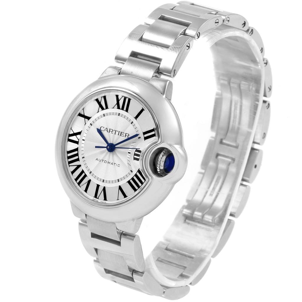 This image shows the Cartier Ballon Bleu W6920071 Women's Stainless Steel Silver Dial W6920071 Women's Stainless Steel Silver Dial watch from an angled side view, highlighting the face, bezel, and metal bracelet.