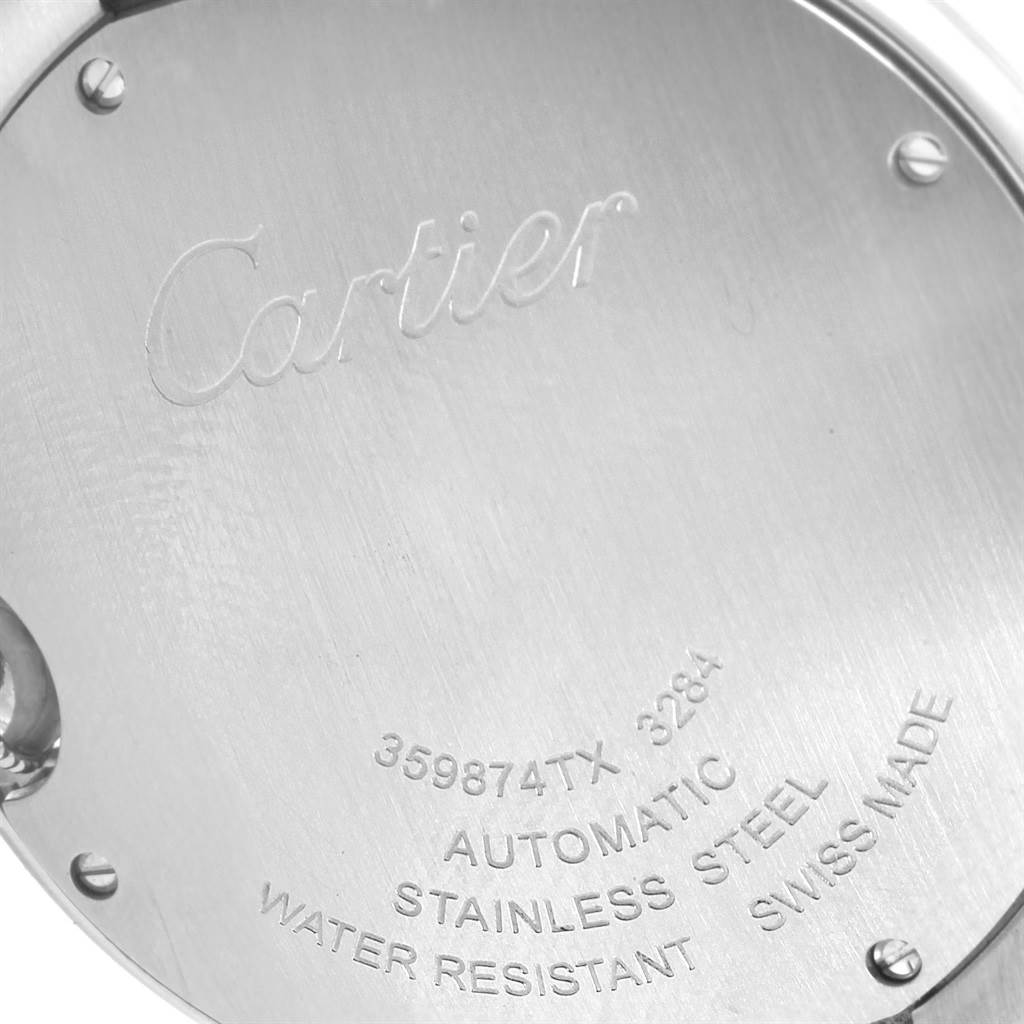 The image shows the back case of the Cartier Ballon Bleu W6920046 Women
s Stainless Steel Silver Dial W6920046 Women
s Stainless Steel Silver Dial watch, featuring engravings of specifications and branding.