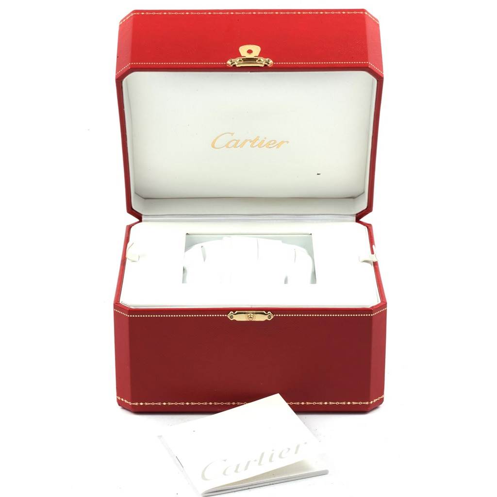 The image shows a red Cartier box for the Ballon Bleu watch with an open view of the interior and a booklet.