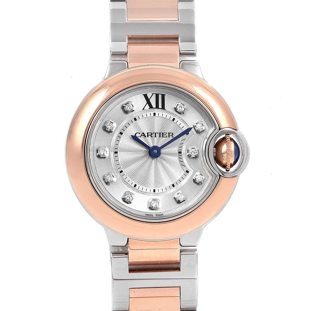 The image shows a front view of the Cartier Ballon Bleu W3BB0005 Women
s Steel and Gold (two tone) Silver Dial W3BB0005 Women
s Steel and Gold (two tone) Silver Dial watch, highlighting the dial, hands, bezel, and part of the bracelet.