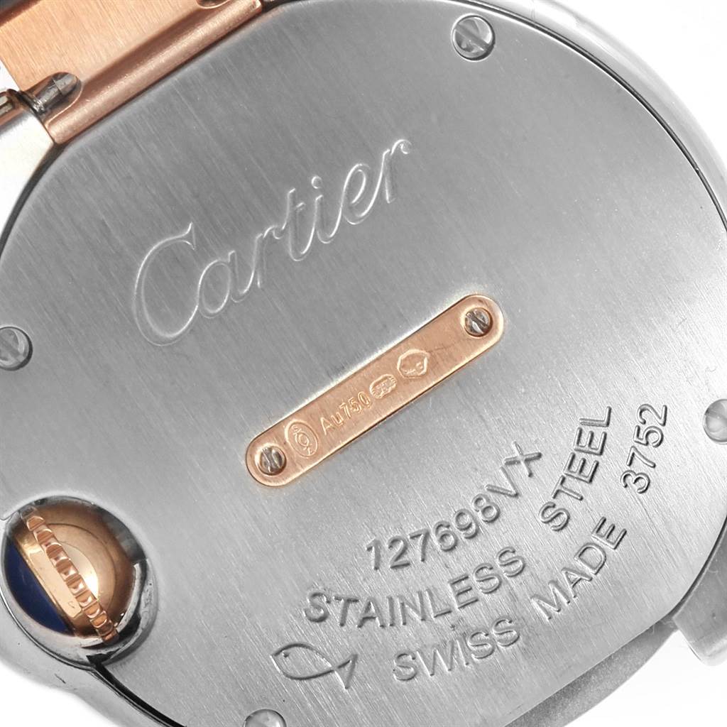 The image shows the back of a Cartier Ballon Bleu W3BB0005 Women
s Steel and Gold (two tone) Silver Dial W3BB0005 Women
s Steel and Gold (two tone) Silver Dial watch, highlighting the stainless steel case and engraving details.