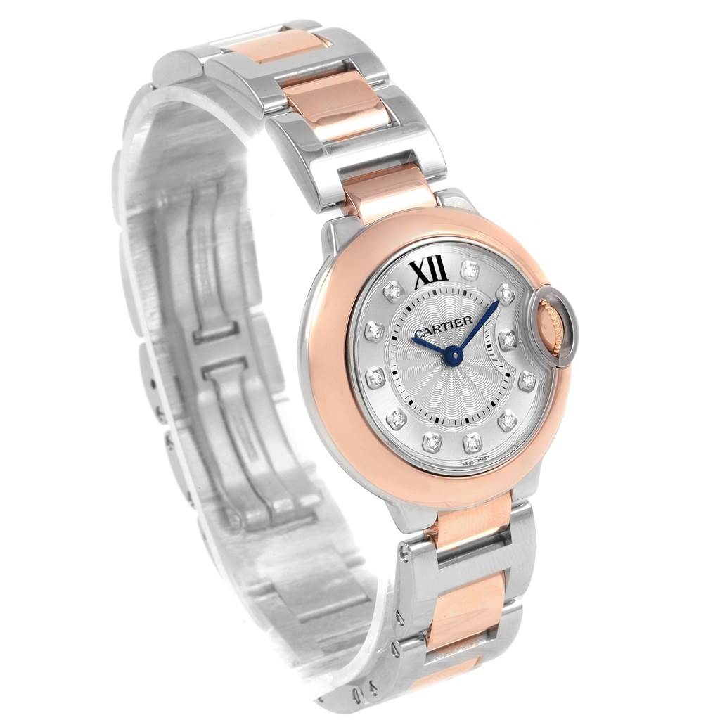 The image shows a front angle view of the Ballon Bleu de Cartier watch, highlighting its dial, bezel, and two-tone bracelet.