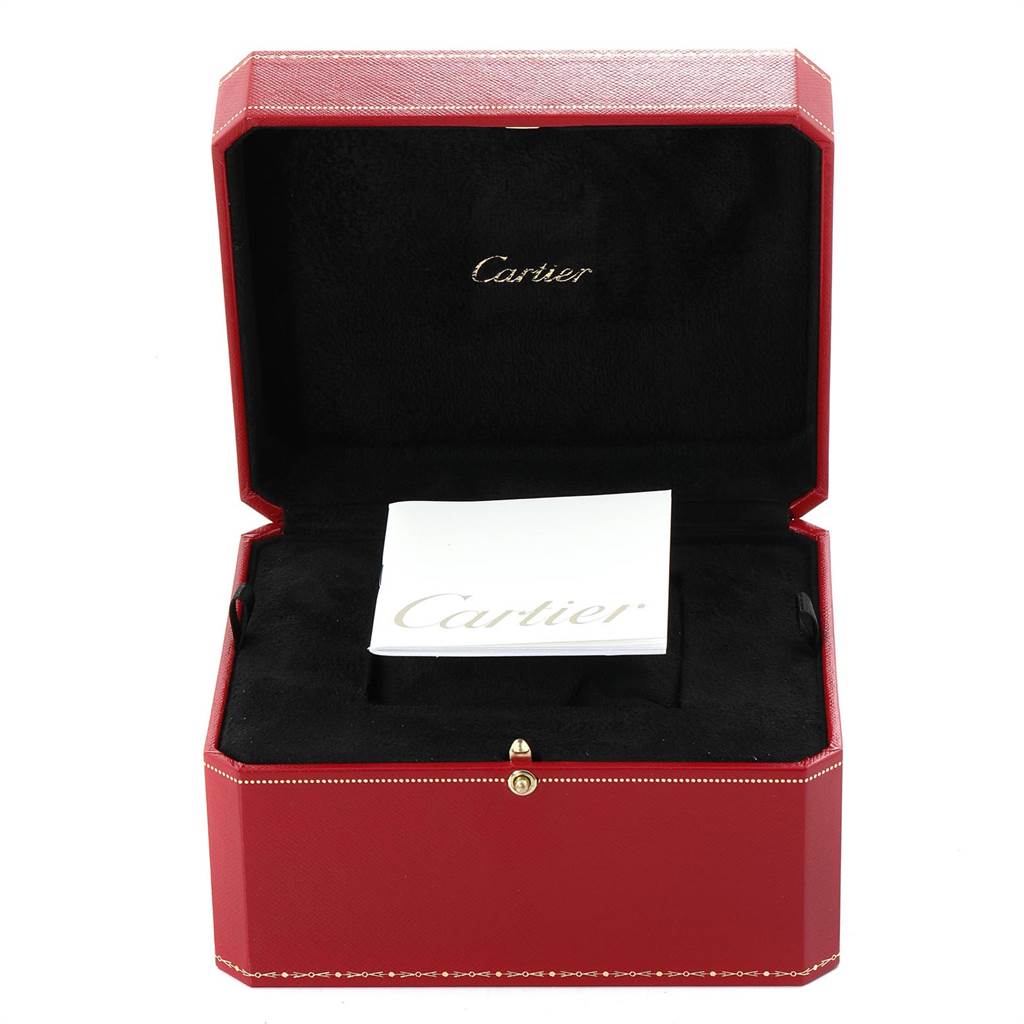 The image shows an open red Cartier box for the Ballon Bleu model, displaying the inner cushion and a booklet.