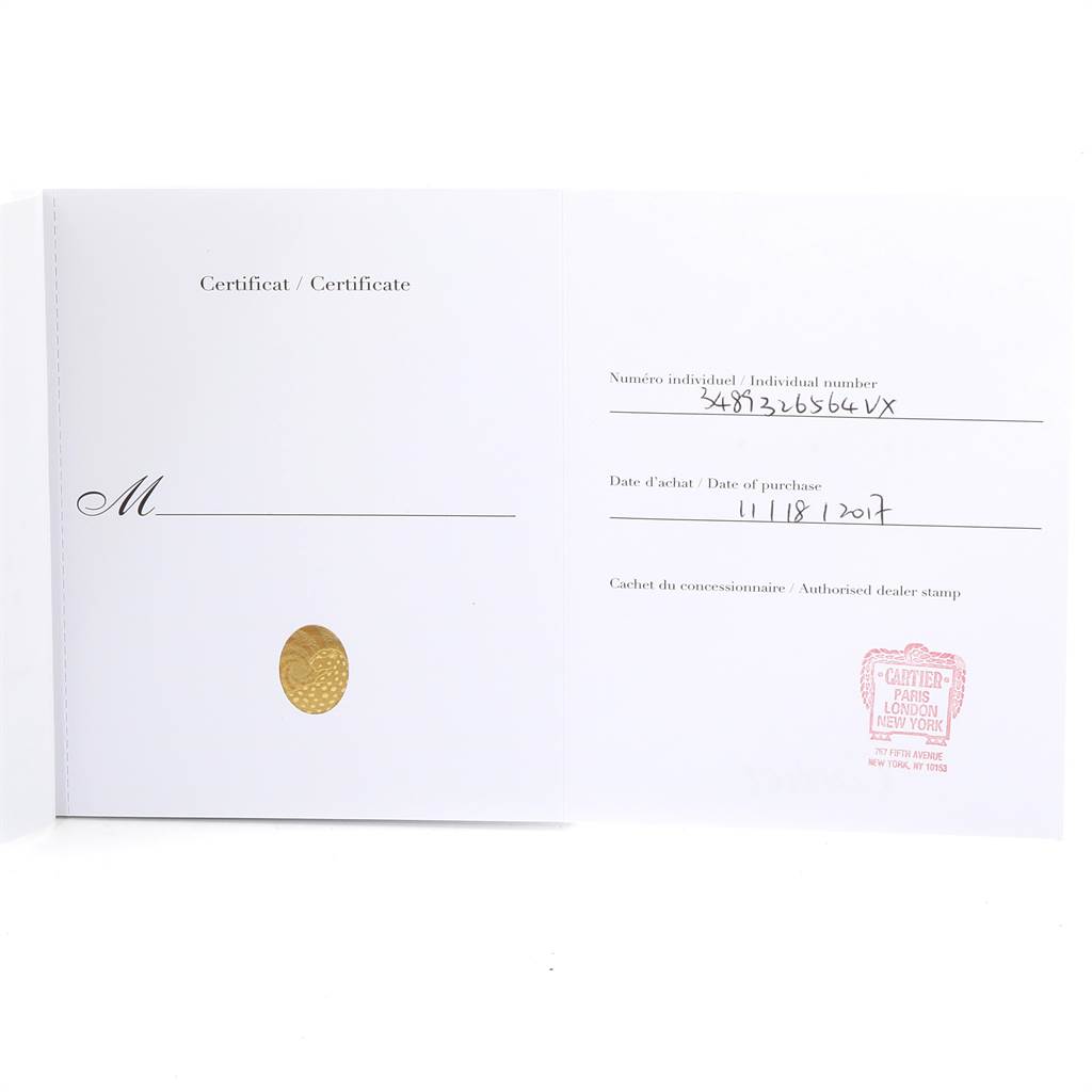 This image shows the certificate of authenticity for the Cartier Ballon Bleu W4BB0009 Women's Stainless Steel Silver Dial W4BB0009 Women's Stainless Steel Silver Dial watch, featuring details like the date of purchase and dealer stamp.