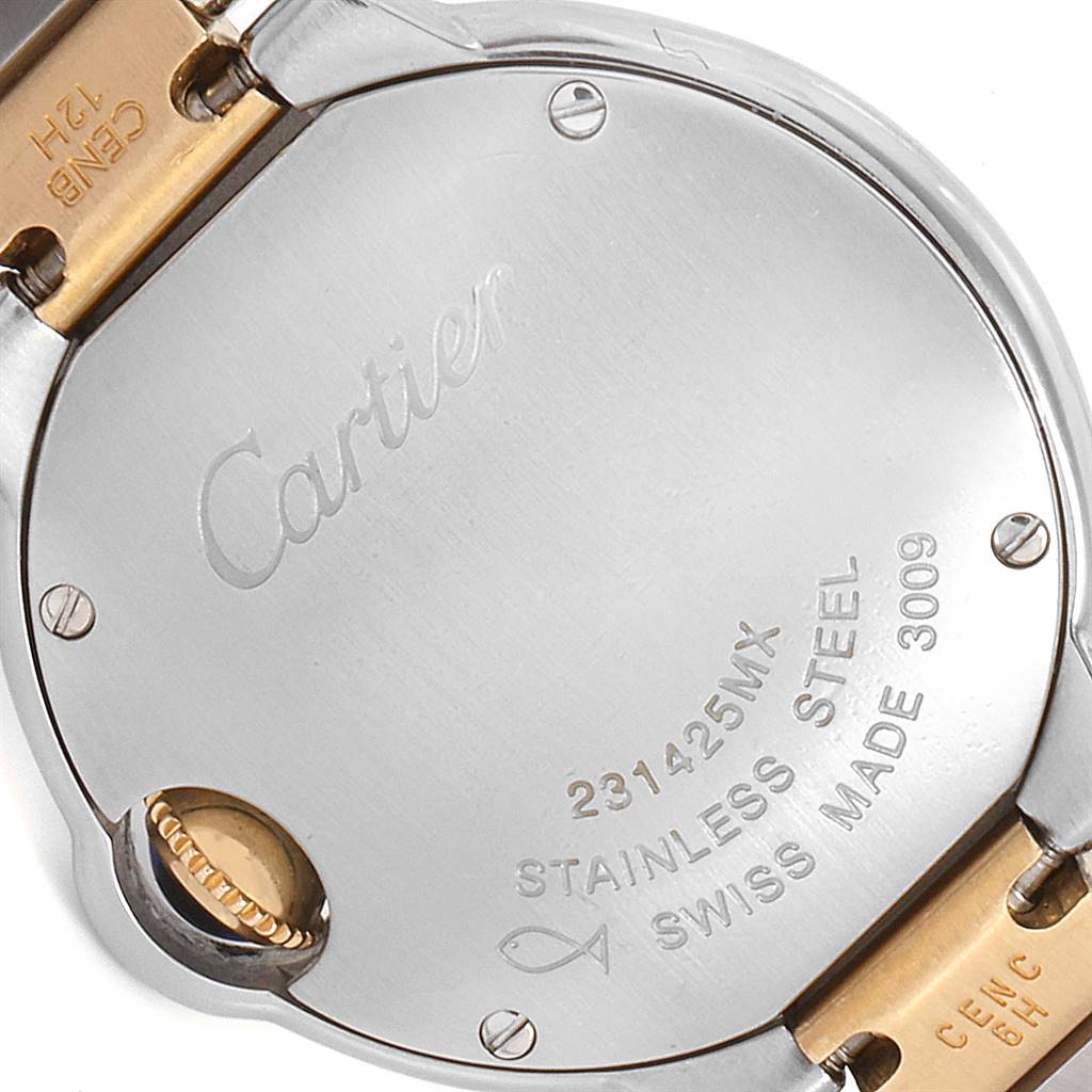 The image shows the back case and part of the bracelet of a Ballon Bleu watch by Cartier.