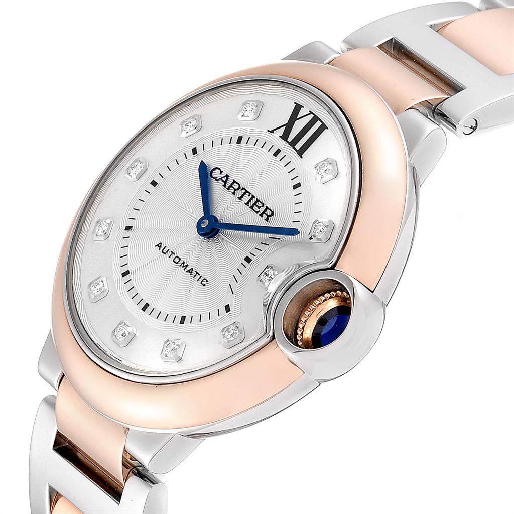 This image shows a close-up angle of the dial and bracelet of the Cartier Ballon Bleu W3BB0018 Women's Steel and Gold (two tone) Silver Dial W3BB0018 Women's Steel and Gold (two tone) Silver Dial watch.