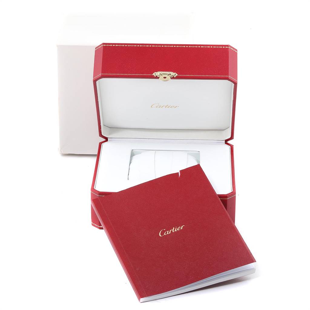 The image shows the packaging box and user manual for the Ballon Bleu model by Cartier, with the box open and manual placed in front.