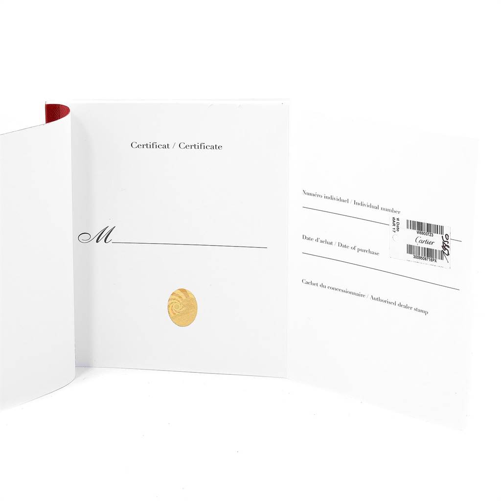 The image shows the certificate and warranty booklet for the Ballon Bleu model by Cartier.