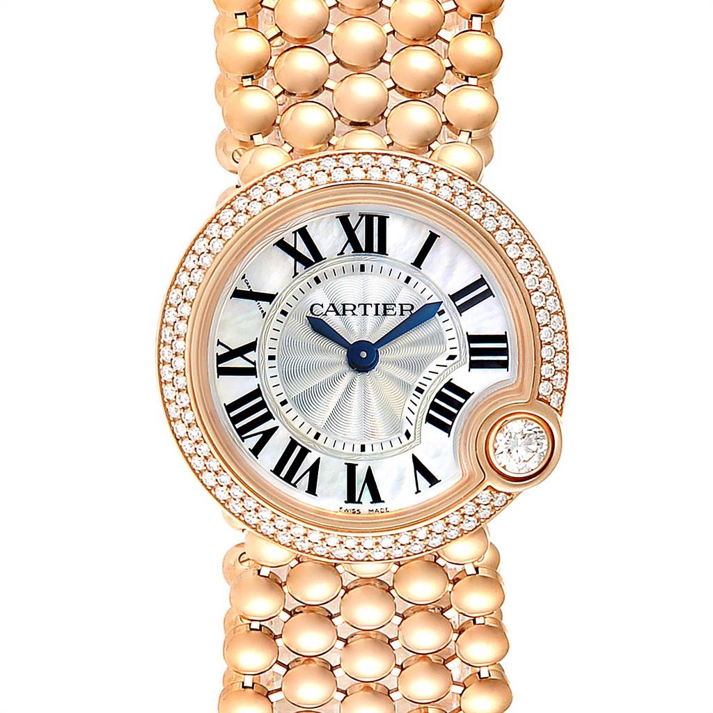 The image shows a frontal view of the Cartier Ballon Bleu watch featuring its round dial, Roman numerals, and a metal strap.