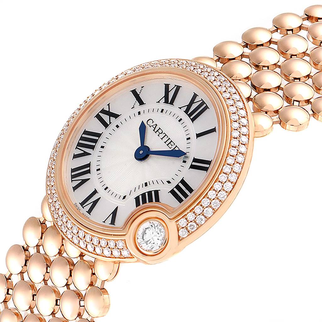 This image shows a close-up angled view of the Cartier Ballon Bleu watch, displaying its face, bezel, and part of the bracelet.