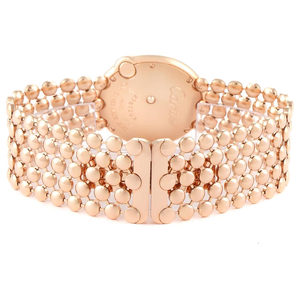 The image shows the back and bracelet of a Ballon Bleu model by Cartier in a gold finish.