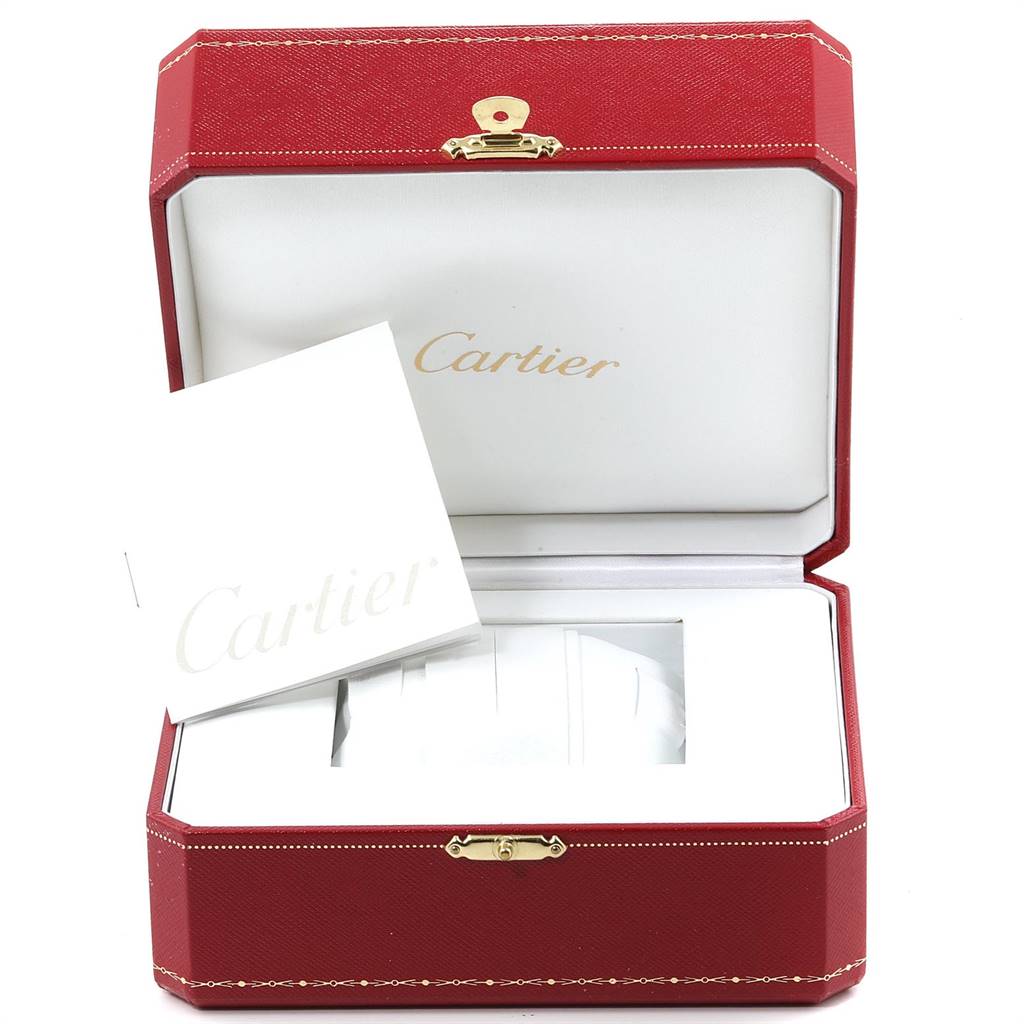 The image shows an open Cartier Ballon Bleu watch box with a booklet inside.