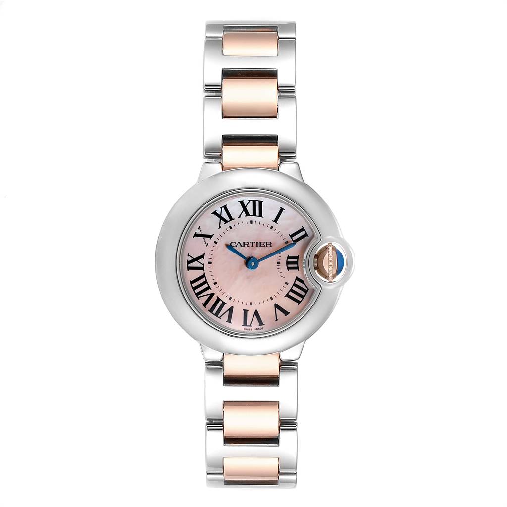 The Ballon Bleu de Cartier watch is shown from a front angle, featuring a two-tone metal bracelet and a pink dial.