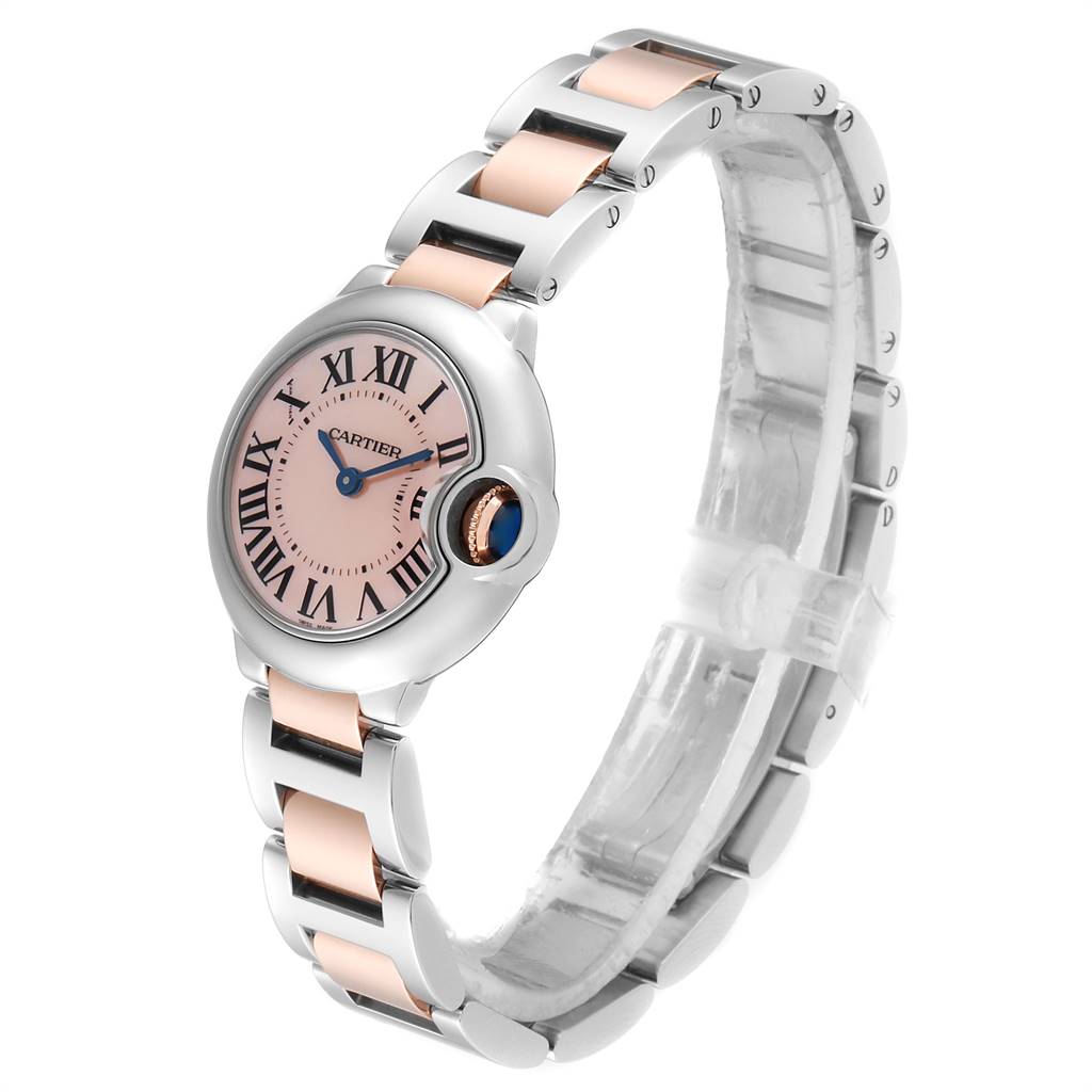 The image shows a side angle view of the Cartier Ballon Bleu W6920034 Women's Steel and Gold (two tone) Mother of Pearl Dial W6920034 Women's Steel and Gold (two tone) Mother of Pearl Dial watch, highlighting its face, bezel, and two-tone metal bracelet.