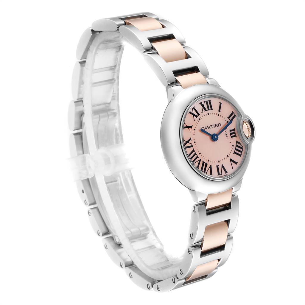 The Cartier Ballon Bleu W6920034 Women's Steel and Gold (two tone) Mother of Pearl Dial W6920034 Women's Steel and Gold (two tone) Mother of Pearl Dial watch is shown at a tilted angle, displaying the watch face, bezel, crown, and part of the bracelet.