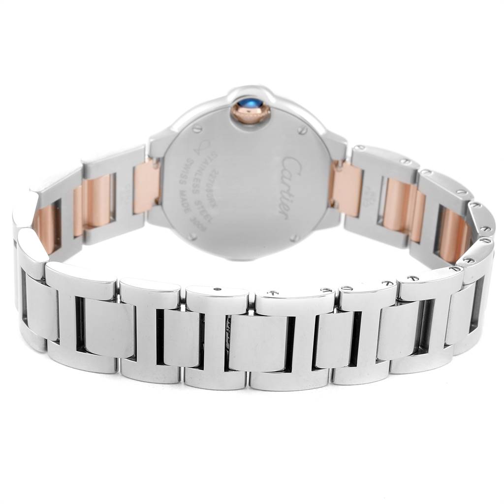 The image shows the back case and bracelet of a Cartier Ballon Bleu W6920034 Women's Steel and Gold (two tone) Mother of Pearl Dial W6920034 Women's Steel and Gold (two tone) Mother of Pearl Dial watch, highlighting its two-tone design.