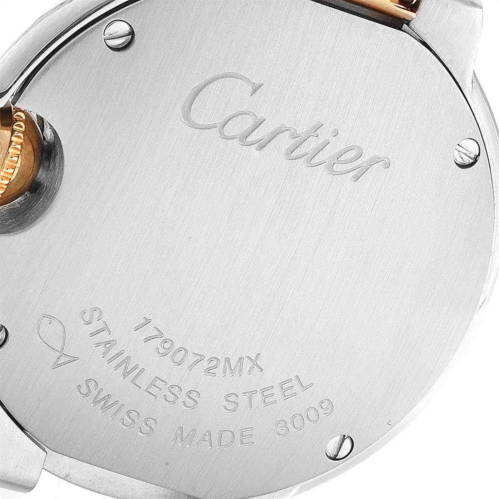 The image shows the back case and part of the crown of the Cartier Ballon Bleu W69007Z3 Women
s Steel and Gold (two tone) Silver Dial W69007Z3 Women
s Steel and Gold (two tone) Silver Dial watch.