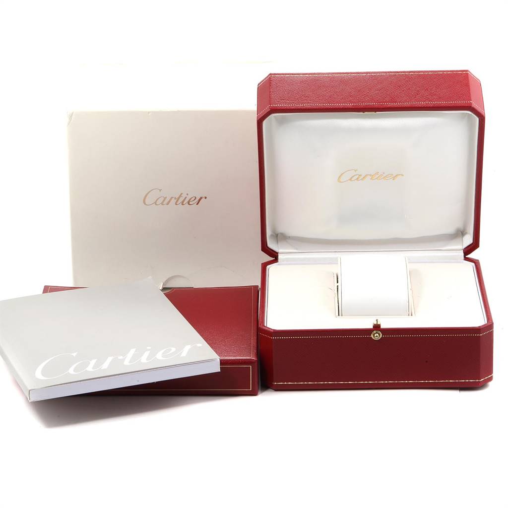The image shows the packaging and accessories for a Ballon Bleu watch by Cartier, including the box and booklet.