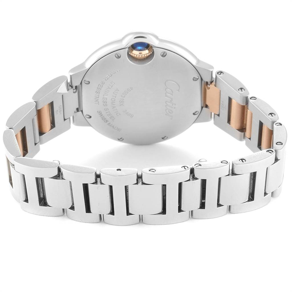 This image shows the back and bracelet of a Cartier Ballon Bleu W6920098 Women
s Steel and Gold (two tone) Mother of Pearl Dial W6920098 Women
s Steel and Gold (two tone) Mother of Pearl Dial watch, highlighting its stainless steel and rose gold links.