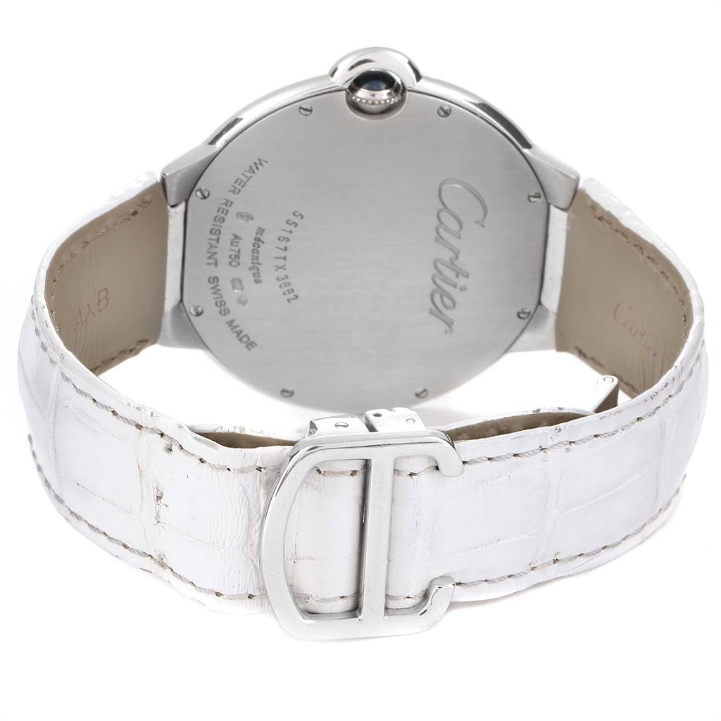 The image shows the back of a Cartier Ballon Bleu WE902056 Women's White Gold Silver Dial WE902056 Women's White Gold Silver Dial watch, highlighting the case back and white leather strap with a deployment buckle.