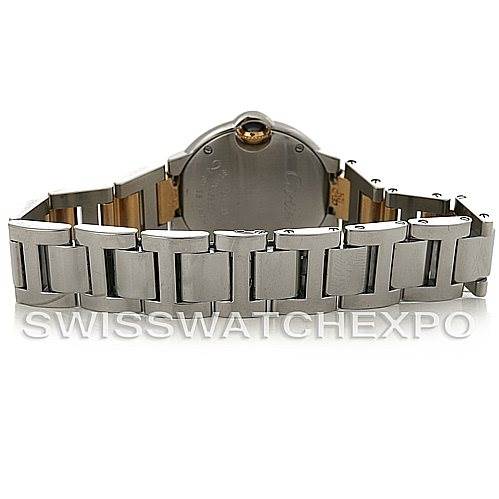 The image shows the back view of a Ballon Bleu model watch by Cartier, highlighting its metal bracelet and clasp.