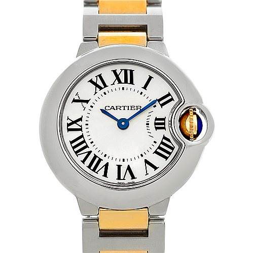 The image shows a front view of the Cartier Ballon Bleu watch, highlighting its face, Roman numerals, and metal strap.