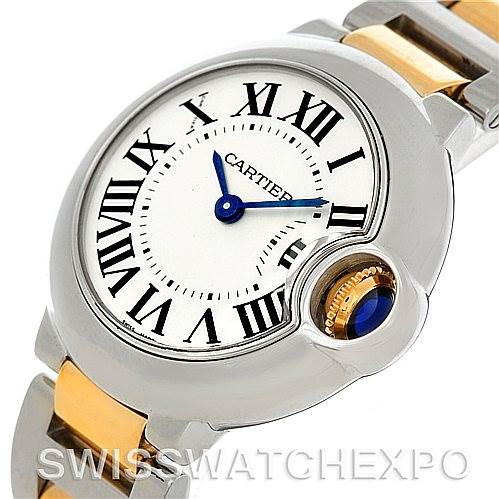 The image displays the face of a Cartier Ballon Bleu W69007Z3 Women
s Stainless Steel Silver Dial W69007Z3 Women
s Stainless Steel Silver Dial watch at an oblique angle, featuring its Roman numeral dial and crown with a blue cabochon.