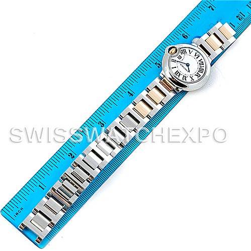 The image shows a Cartier Ballon Bleu W69007Z3 Women
s Stainless Steel Silver Dial W69007Z3 Women
s Stainless Steel Silver Dial watch laid flat alongside a blue ruler.