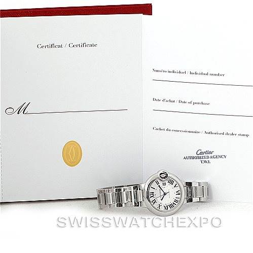 The image shows a Cartier Ballon Bleu W6920071 Women's Stainless Steel Silver Dial W6920071 Women's Stainless Steel Silver Dial watch with its certificate and papers, viewed from the front.