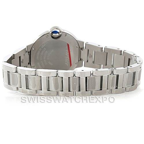 The image shows the back view of a Ballon Bleu de Cartier watch, highlighting its stainless steel bracelet and case back.
