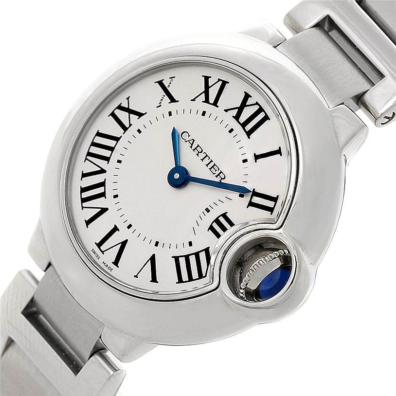This image shows a close-up angle of the Cartier Ballon Bleu W69007Z3 Women
s Stainless Steel Silver Dial W69007Z3 Women
s Stainless Steel Silver Dial watch face and part of its metal bracelet.