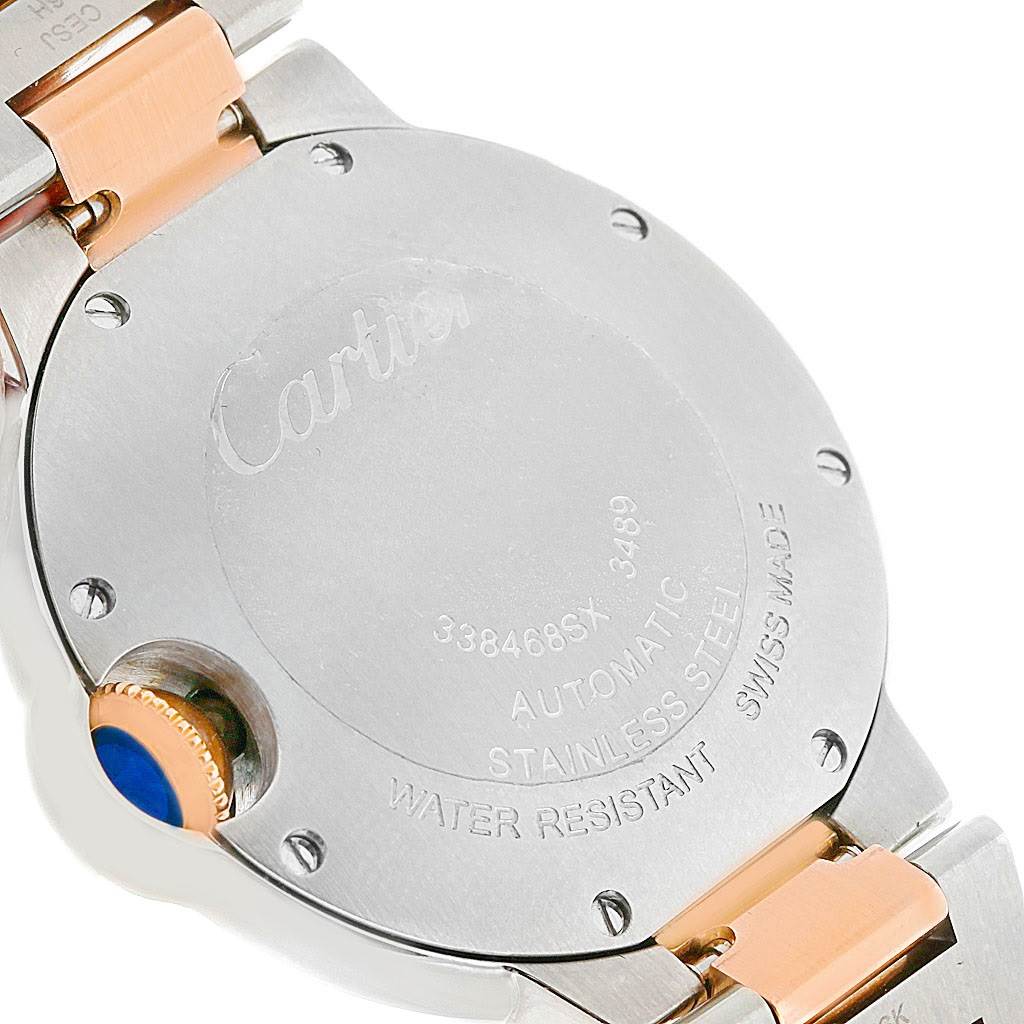 The image shows a close-up of the back case and strap connection of a Cartier Ballon Bleu W6920070 Women's Steel and Gold (two tone) Mother of Pearl Dial W6920070 Women's Steel and Gold (two tone) Mother of Pearl Dial watch.