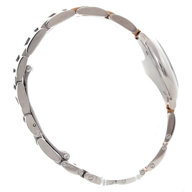 The image shows a side profile of a Cartier Ballon Bleu W69011Z4 Women's Steel and Gold (two tone) Mother of Pearl Dial W69011Z4 Women's Steel and Gold (two tone) Mother of Pearl Dial watch, showcasing its bracelet and case.